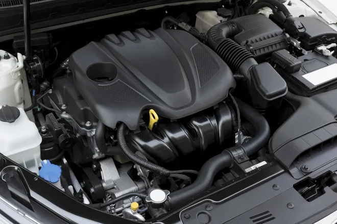 A clean engine being inspected